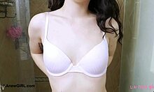 Elegant dark-haired model enjoys a sensual bath