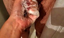 hot stepbrother gets handjob pleasure in shower while wife is away