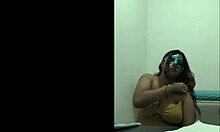 brunette student takes questionnaire, touches breasts sexy way