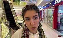 she walks through the mall with cum on her face after a blowjob in the toilet