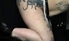 Blonde tattooed goth femdom dominates with sexy small tits