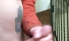 Intense solo masturbation on apartment stairs while neighbor chats in garage