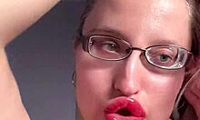 Suggestive Big Lips And Long Tongue In Lipstick