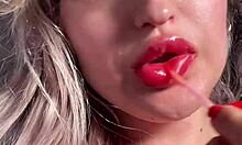 Suggestive Big Lips And Long Tongue In Lipstick