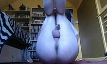 Chubby guy does naked exercises