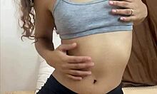 Petite teen fingers horny pussy