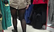 a hidden camera in a fitting room admires a juicy pawg and peeping for legs in a public mall voyeur fetishist