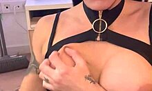 Tattooed brunette in leather lingerie performs intense sexy dance and reaches powerful orgasm while masturbating with dildo.