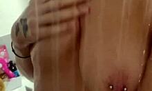 Horny british slut plays with herself in the shower