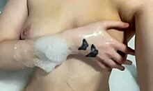 Horny british slut plays with herself in the shower