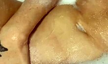 Horny british slut plays with herself in the shower