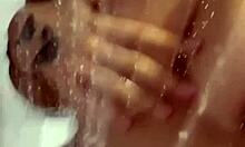 Horny british slut plays with herself in the shower