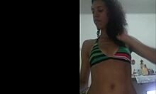 Teasing in a red bikini