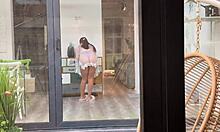 New neighbor observes roommate's intimate encounter with stranger involving oral and manual stimulation