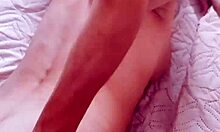 Beautiful wife poses in fishnet stockings for close-up