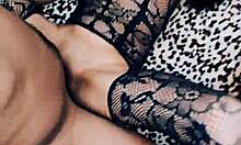 Beautiful wife poses in fishnet stockings for close-up