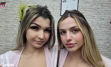 student girls kissing in wet bedroom scene