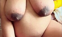 Pregnant Arab woman enjoys solo sessions with big boobs and hairy pussy