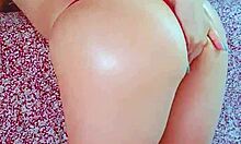 oiled college student in red brazilian thong