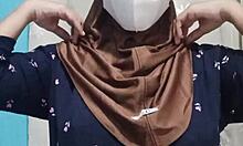 Beautiful hijab-wearing student indulges in private toy exploration when the house is quiet