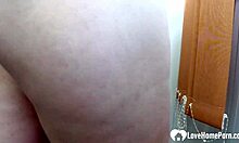 brunette with small tits kneeling and masturbating