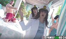 step parents foursome with step daughters in family gathering.