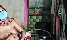 Mother-in-law in hijab casually masturbating at home