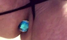 Wearing black lingerie with a butt plug, what are you up to?