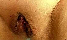 hey, check out this mature babe flashing her big bald wet pussy