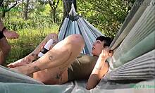 happy satisfaciendose en la hamaca al aire libre en la naturaleza la mancha españa