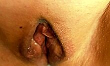 hey, check out this mature babe flashing her big bald wet pussy