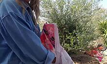 Nippleringlover's kinky mother plays with her pierced pussy and extreme pierced nipples outdoors.