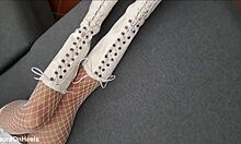 Perfect-assed milf in high-heeled boots and fishnet stockings