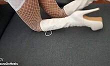 Perfect-assed milf in high-heeled boots and fishnet stockings