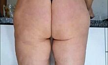 hidden camera catches stepmom in kitchen wearing only panties and see-through blouse