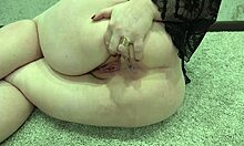 Close-up chubby milf shows natural boobs, panties, big booty, and hairy pussy