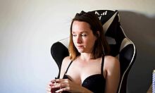 Busty Brunette Smoking Seductively In Black Bra