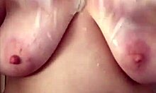 Big Boob Mama Showers Washing Hair And Shaving