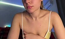 Watch her play with those natural tits and finger her pussy!