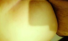 She moans deliciously on the bed