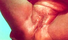 In the Asian village on the ranch, the wife is fingering her pussy deeply.