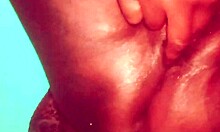 In the Asian village on the ranch, the wife is fingering her pussy deeply.