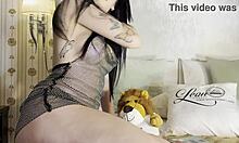 hot brunette babe teases guy under towel with big tits ass see-through dress