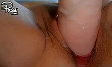 Horny girlfriend fucks wet shaved pussy with dildo up close!