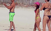 Young Bikini Girl's Thong Teases On Beach With Boyfriend's Friends