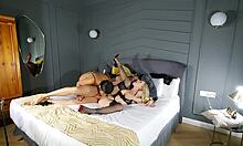 blonde and brunette babes share huge cock in steamy threesome with bisexual pussy licking action