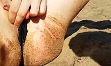 Hey fingering wet pussy on beach hits orgasm hard