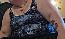 bbw milf brunette strips teases rips clothes does yoga stretches huge tits ass