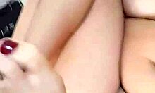 she spreads her huge natural tits and feet while teasing her swollen clit and big pussy lips