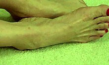 sexy granny fingers her shaved pussy hard on the floor